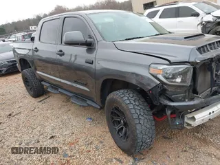 2021 Toyota Tundra SR5 with VIN 5TFDY5F17MX970027, listed as a IAAI auction lot 41837816 with 128,495 mi miles and . Bid and sale history available at DreamBid. Image 1.