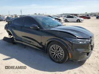 2024 Ford Mustang Mach-E Premium z VIN 3FMTK3R73RMA03067, wystawiony jako Copart lot #47993885 z przebiegiem 13 427 mil mil oraz Szkoda całkowita • Salvage title. Historia ofert i sprzedaży dostępna na DreamBid. Obrazek 4.