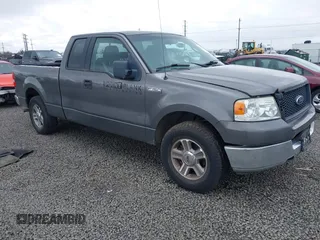 2005 Ford F-150 STX with VIN 1FTRX12W65NA60997, listed as a IAAI auction lot 41836976 with 170,400 mi miles. Bid and sale history available at carsss.com. Image 1.