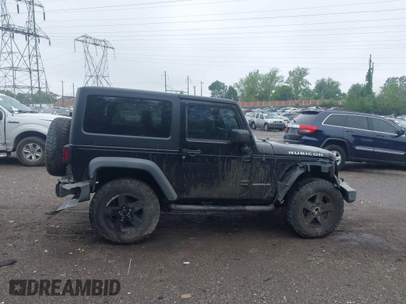 2007 Jeep Wrangler Rubicon with VIN 1J4GA64117L149666, listed as a IAAI auction lot 42252464 with 100,791 mi miles and . Bid and sale history available at DreamBid. Image 13.