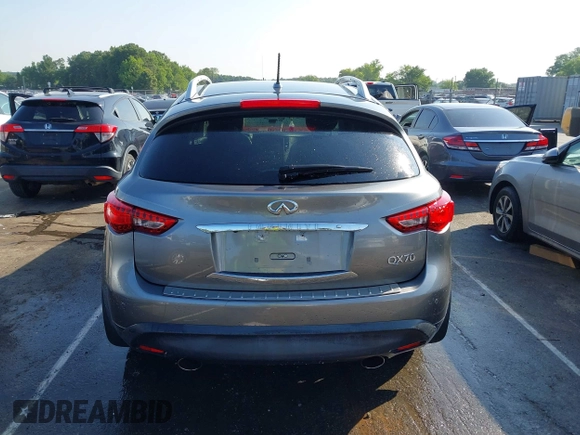 2017 Infiniti QX70 z VIN JN8CS1MW4HM410322, wystawiony jako IAAI lot #42285313 z przebiegiem 126 031 mil mil oraz . Historia ofert i sprzedaży dostępna na DreamBid. Obrazek 16.