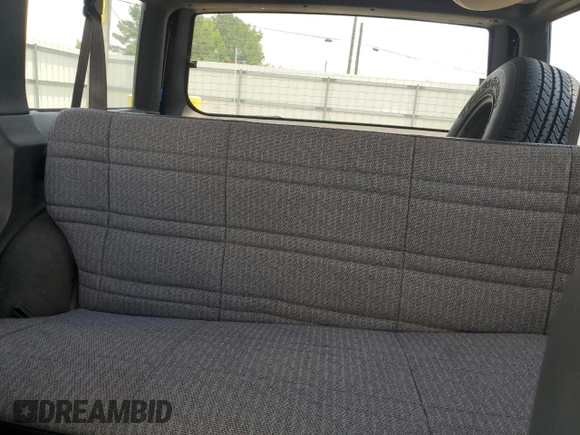 1999 Jeep Cherokee Sport with VIN 1J4FT68SXXL669549, listed as a Copart auction lot 62367015 with 194,446 mi miles and Salvage title. Bid and sale history available at DreamBid. Image 10.