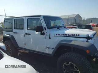 2015 Jeep Wrangler Unlimited Rubicon with VIN 1C4BJWFG1FL602412, listed as a IAAI auction lot 42065619 with 109,070 mi miles. Bid and sale history available at carsss.com. Image 13.