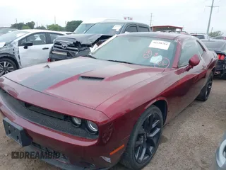2019 Dodge Challenger SXT z VIN 2C3CDZAGXKH632914, wystawiony jako IAAI lot #42218764 z przebiegiem Nie podano mil oraz . Historia ofert i sprzedaży dostępna na DreamBid. Obrazek 2.