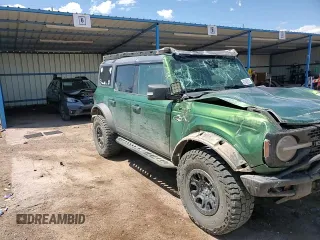 2022 Ford Bronco с VIN 1FMEE5DP0NLA72491, выставлен на аукционе Copart как лот 62482815 с пробегом 80 184 миль миль и Списание • Salvage title. История ставок и продаж доступна на DreamBid. Изображение 13.