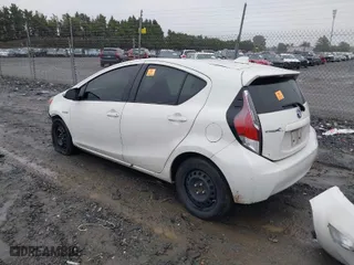 2016 Toyota Prius c One with VIN JTDKDTB32G1135152, listed as a IAAI auction lot 40400174 with 164,685 mi miles. Bid and sale history available at carsss.com. Image 3.
