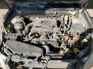 2010 Subaru Legacy Premium All-Weather Anniversary with VIN 4S3BMBC65A3219450, listed as a Copart auction lot 48061145 with 314,339 mi miles and Salvage Title. Bid and sale history available at DreamBid. Image 12.