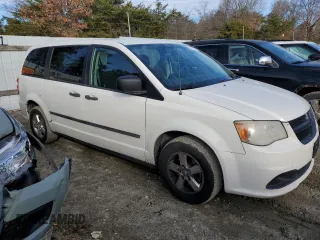 2012 Ram Cargo Van with VIN 2C4RDGAG9CR257801, listed as a Copart auction lot 87020354 with 263,017 mi miles and Clean Title. Bid and sale history available at carsss.com. Image 4.