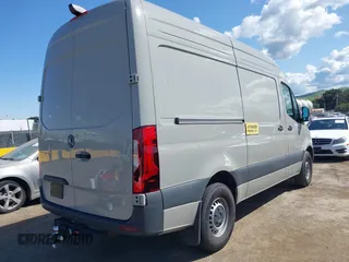 2025 Mercedes-Benz Sprinter Cargo with VIN W1Y4KBHY9ST205086, listed as a IAAI auction lot 41922358 with 5,590 mi miles. Bid and sale history available at carsss.com. Image 4.