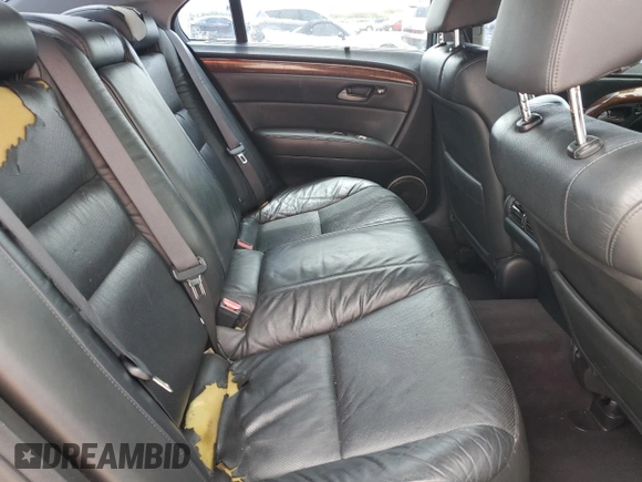 2005 Acura RL z VIN JH4KB16535C018850, wystawiony jako Copart lot #59306055 z przebiegiem 131 881 mil mil oraz Szkoda całkowita • Salvage title. Historia ofert i sprzedaży dostępna na DreamBid. Obrazek 10.