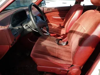 1991 Ford Escort z VIN 1FAPP14JXMW279906, wystawiony jako Copart lot #71882954 z przebiegiem 190 721 mil mil oraz Tytuł czysty. Historia ofert i sprzedaży dostępna na DreamBid. Obrazek 7.