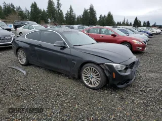2014 BMW 4 Series 428i xDrive with VIN WBA3N5C59EF716495, listed as a Copart auction lot 37768323 with 88,371 mi miles and Salvage Title. Bid and sale history available at DreamBid. Image 4.