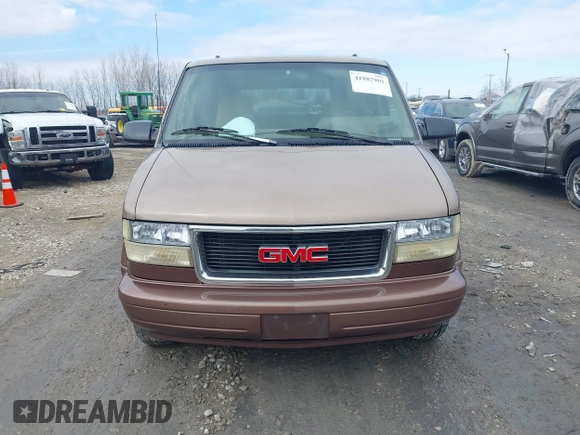 1995 GMC Safari Passenger with VIN 1GKDM19W1SB500991, listed as a IAAI auction lot 41887901 with 210,518 mi miles. Bid and sale history available at carsss.com. Image 6.