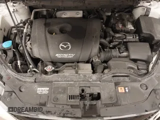 2014 Mazda CX-5 Grand Touring with VIN JM3KE4DY3E0374036, listed as a IAAI auction lot 41889030 with 162,611 mi miles and . Bid and sale history available at DreamBid. Image 10.