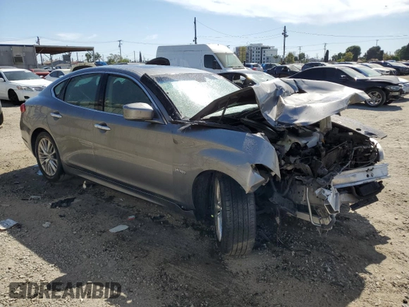 2012 Infiniti M Hybrid with VIN JN1EY1APXCM910481, listed as a Copart auction lot 52943285 with Not Provided miles and Salvage Title. Bid and sale history available at DreamBid. Image 4.