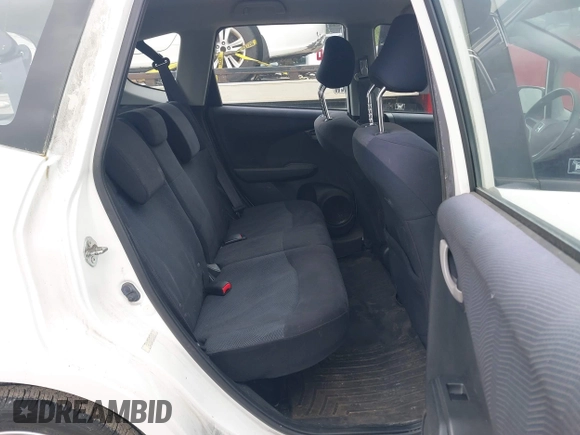 2011 Honda Fit Sport z VIN JHMGE8H51BC016707, wystawiony jako IAAI lot #42341893 z przebiegiem 326 759 mil mil oraz . Historia ofert i sprzedaży dostępna na DreamBid. Obrazek 8.
