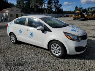 2013 Kia Rio LX with VIN KNADM4A38D6219536, listed as a Copart auction lot 72192754 with 74,307 mi miles and Salvage Title. Bid and sale history available at carsss.com. Image 4.