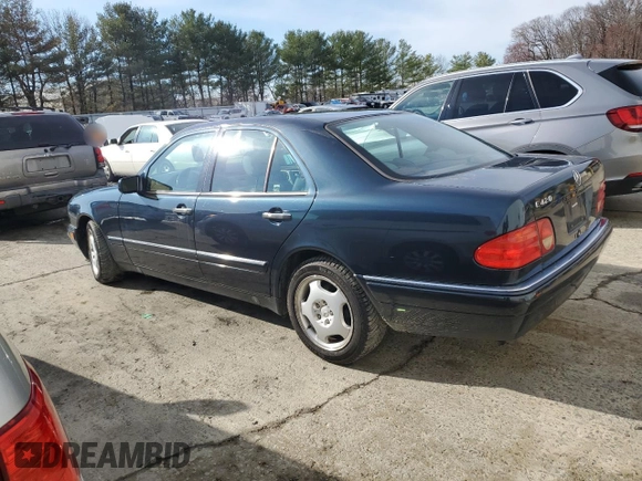 1997 Mercedes-Benz E-Class with VIN WDBJF72F8VA462335, listed as a Copart auction lot 50230895 with 97,831 mi miles and Salvage Title. Bid and sale history available at carsss.com. Image 2.