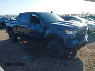 2023 Chevrolet Silverado 1500 LT Trail Boss with VIN 3GCUDFE8XPG152588, listed as a IAAI auction lot 41824795 with 21,903 mi miles and . Bid and sale history available at DreamBid. Image 1.