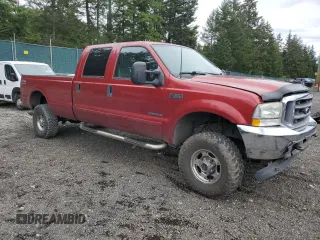 2002 Ford F-350 XL with VIN 1FTSW31F62ED57006, listed as a Copart auction lot 57156665 with 173,244 mi miles and Salvage title. Bid and sale history available at DreamBid. Image 4.