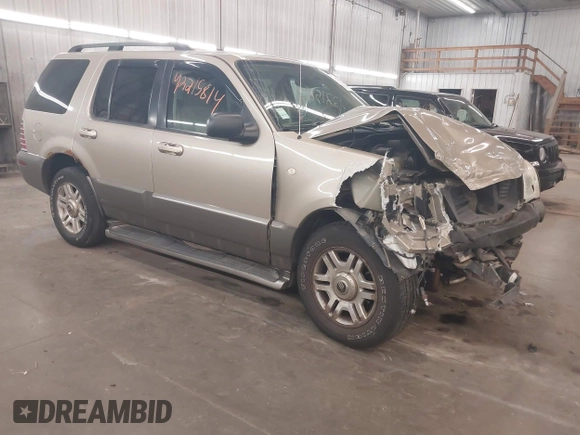 2003 Mercury Mountaineer Convenience z VIN 4M2ZU86K23ZJ06043, wystawiony jako IAAI lot #42215814 z przebiegiem 259 172 mil mil oraz . Historia ofert i sprzedaży dostępna na DreamBid. Obrazek 1.