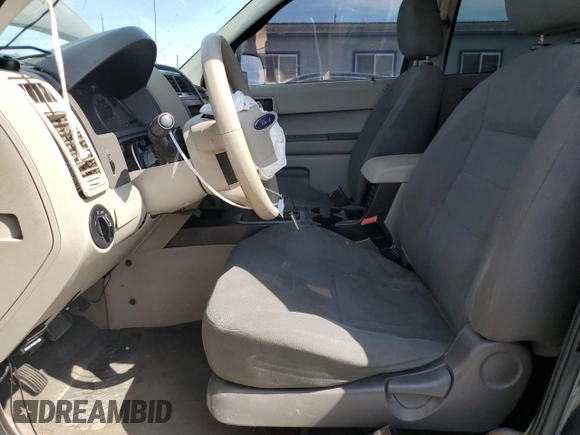 2008 Ford Escape XLS с VIN 1FMCU02Z08KB06103, выставлен на аукционе Copart как лот 60934415 с пробегом Не указан миль и Списание • Salvage title. История ставок и продаж доступна на DreamBid. Изображение 7.