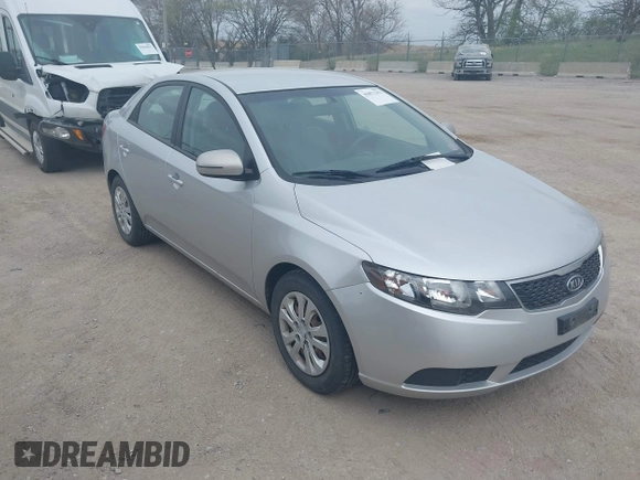 2012 Kia Forte EX with VIN KNAFU4A25C5591601, listed as a IAAI auction lot 42071351 with 120,636 mi miles. Bid and sale history available at carsss.com. Image 1.