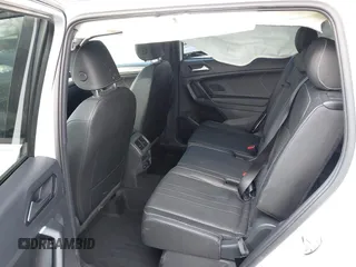2023 Volkswagen Tiguan SE R-Line Black with VIN 3VVCB7AX3PM014446, listed as a IAAI auction lot 42016885 with 12,726 mi miles and . Bid and sale history available at DreamBid. Image 8.