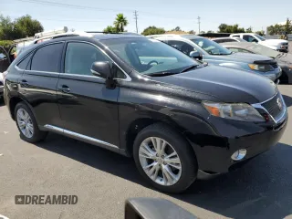 2011 Lexus RX 450h with VIN JTJBC1BA2B2421668, listed as a Copart auction lot 62427415 with 175,321 mi miles and Salvage title. Bid and sale history available at DreamBid. Image 4.