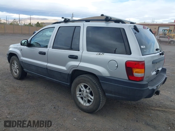 2004 Jeep Grand Cherokee Laredo with VIN 1J4GW48N14C434351, listed as a IAAI auction lot 41860077 with 152,404 mi miles and . Bid and sale history available at DreamBid. Image 3.
