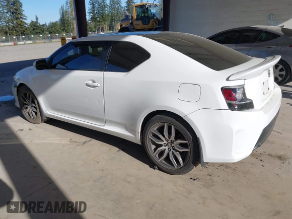 2014 Scion tC with VIN JTKJF5C7XE3073478, listed as a IAAI auction lot 42058385 with 151,491 mi miles. Bid and sale history available at carsss.com. Image 3.
