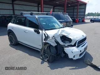 2015 MINI Countryman S z VIN WMWZC5C56FWP45194, wystawiony jako IAAI lot #40300703 z przebiegiem 95 760 mil mil oraz . Historia ofert i sprzedaży dostępna na DreamBid. Obrazek 1.