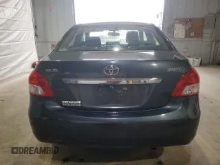 2009 Toyota Yaris z VIN JTDBT903991335683, wystawiony jako Copart lot #52565155 z przebiegiem 143 737 mil mil oraz Szkody całkowita. Historia ofert i sprzedaży dostępna na DreamBid. Obrazek 6.