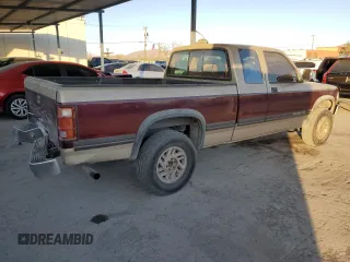 1993 Dodge Dakota z VIN 1B7GG23Y1PS228983, wystawiony jako Copart lot #86064534 z przebiegiem 237 006 mil mil oraz Szkoda całkowita • Salvage title. Historia ofert i sprzedaży dostępna na DreamBid. Obrazek 3.