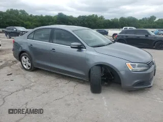 2014 Volkswagen Jetta TDI w/Premium/Nav z VIN 3VWLL7AJ1EM430822, wystawiony jako Copart lot #57405845 z przebiegiem 112 178 mil mil oraz Szkoda całkowita • Salvage title. Historia ofert i sprzedaży dostępna na DreamBid. Obrazek 4.