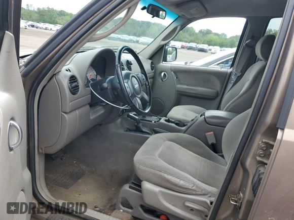 2002 Jeep Liberty Limited with VIN 1J4GL58K22W120496, listed as a Copart auction lot 62561875 with 161,388 mi miles and Salvage title. Bid and sale history available at DreamBid. Image 7.