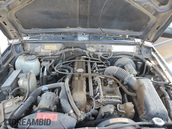 1994 Jeep Cherokee SE with VIN 1J4FJ28S7RL175098, listed as a Copart auction lot 52568445 with 108,574 mi miles and Salvage Title. Bid and sale history available at carsss.com. Image 12.