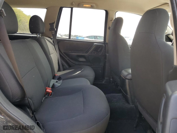 2004 Jeep Grand Cherokee Laredo with VIN 1J4GW48S44C100529, listed as a Copart auction lot 51022405 with 169,966 mi miles and Clean Title. Bid and sale history available at carsss.com. Image 11.
