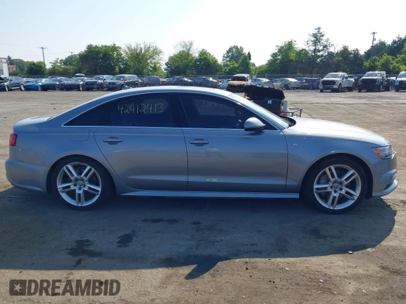 2017 Audi A6 Premium with VIN WAUF8AFC6HN078756, listed as a IAAI auction lot 42412413 with 149,930 mi miles and . Bid and sale history available at DreamBid. Image 14.