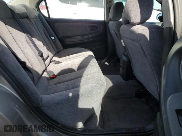 2000 Nissan Maxima GXE z VIN JN1CA31D2YT726856, wystawiony jako Copart lot #45950615 z przebiegiem 101 919 mil mil oraz Szkoda całkowita • Salvage title. Historia ofert i sprzedaży dostępna na DreamBid. Obrazek 10.