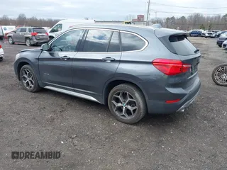 2017 BMW X1 xDrive28i with VIN WBXHT3Z39H4A57753, listed as a IAAI auction lot 41726790 with 52,509 mi miles. Bid and sale history available at carsss.com. Image 3.