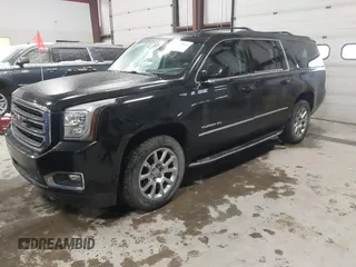 2015 GMC Yukon XL SLT with VIN 1GKS2HKC9FR175011, listed as a IAAI auction lot 41510519 with 194,136 mi miles. Bid and sale history available at carsss.com. Image 17.