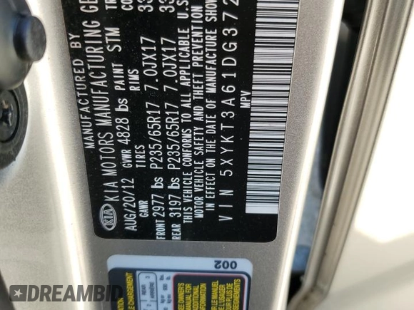 2013 Kia Sorento LX with VIN 5XYKT3A61DG372659, listed as a Copart auction lot 57787855 with 61,489 mi miles and Salvage title. Bid and sale history available at DreamBid. Image 13.