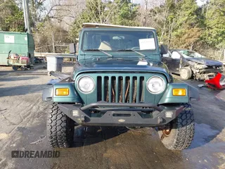 2001 Jeep Wrangler Sport with VIN 1J4FA49S71P315061, listed as a IAAI auction lot 41525441 with 178,809 mi miles. Bid and sale history available at carsss.com. Image 12.