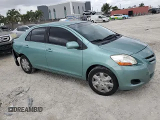 2007 Toyota Yaris with VIN JTDBT923271052472, listed as a Copart auction lot 50942975 with 147,363 mi miles and Salvage Title. Bid and sale history available at DreamBid. Image 4.