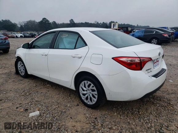 2019 Toyota Corolla L with VIN 5YFBURHE8KP877250, listed as a Copart auction lot 46401935 with 123,783 mi miles and Salvage Title. Bid and sale history available at DreamBid. Image 2.