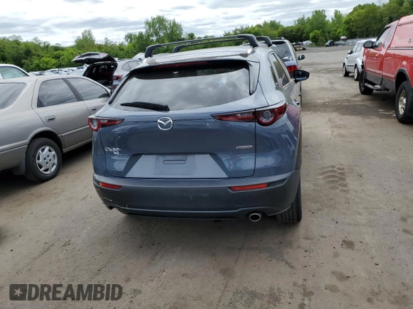 2022 Mazda CX-30 S Carbon Edition with VIN 3MVDMBCL7NM408036, listed as a Copart auction lot 56683665 with 82,337 mi miles and Salvage title. Bid and sale history available at DreamBid. Image 6.