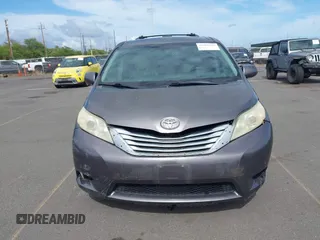 2011 Toyota Sienna XLE AAS with VIN 5TDYK3DC3BS059501, listed as a IAAI auction lot 42185225 with 143,416 mi miles. Bid and sale history available at carsss.com. Image 12.