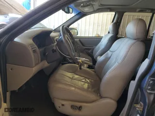 2001 Jeep Grand Cherokee Laredo with VIN 1J4GW48N41C557380, listed as a Copart auction lot 74080604 with 58,005 mi miles and Salvage Title. Bid and sale history available at carsss.com. Image 7.