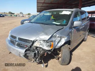 2015 Dodge Grand Caravan SXT with VIN 2C4RDGCG1FR649074, listed as a IAAI auction lot 41759409 with 116,856 mi miles and . Bid and sale history available at DreamBid. Image 2.